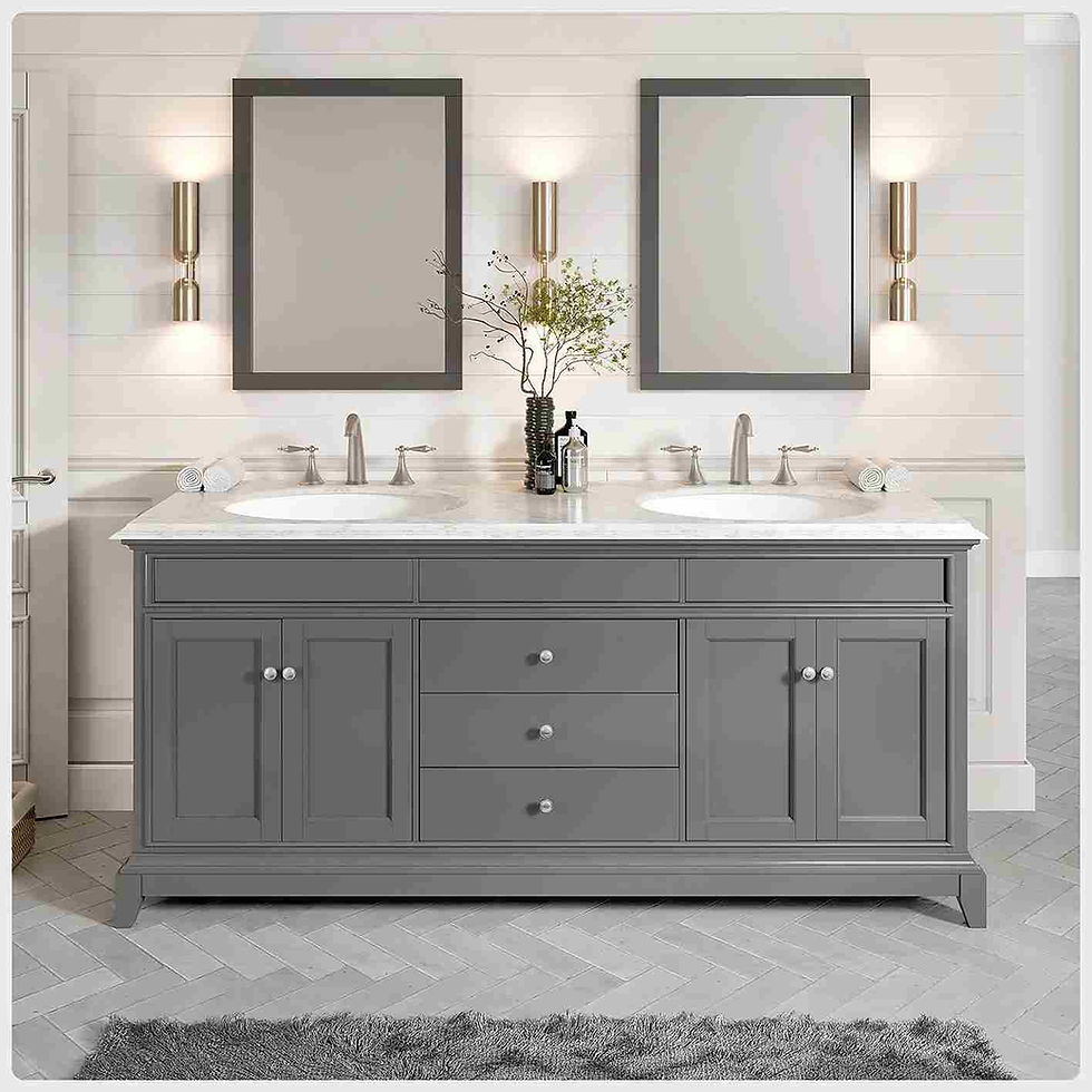 Gray double-sink vanity with mirrors and wall lights, set against a light wall. Items include vases, soap, and rolled towels.