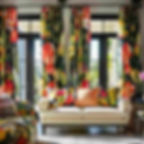 Bright living room with tropical curtains and a beige sofa adorned with colorful floral cushions. Sunlight streams through large windows.