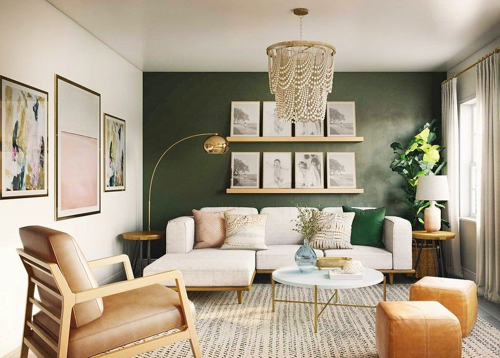 Elegant living room with a beige sofa, colorful cushions, and a round table. Green accent wall, art, chandelier, and potted plant add charm.