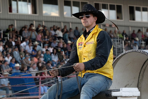 Tuff Dreger riding a chuckwagon