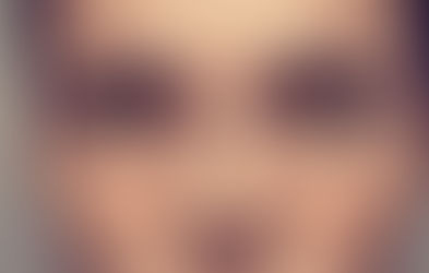 A woman's freckled face.