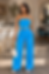 Woman wearing the blue Azure Dream Pant Set in a restaurant