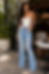 Woman in Azure Dream Pant Set with white corset top