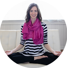 Leslie-white-couch-cross-leg-CIRCLE.png