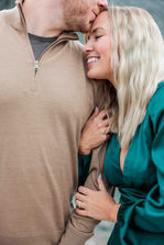 Couple hugging after getting engaged in Banff National Park