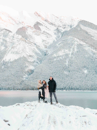 Family portraits in front of stunning mountain backdrops