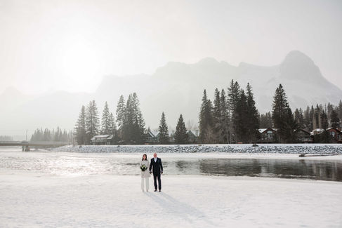 Couple holding hands during their portraits