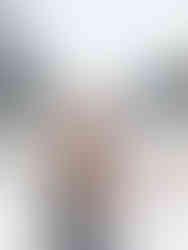 Mom and Dad posing for their pictures at Lake Louise