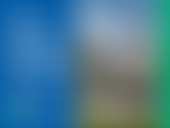 Modern two-storey home with a zinc roof, large floor-to-ceiling windows, brick and rendered exterior, and a landscaped lawn. The graphic includes a blue and green branded layout with the headline ‘Award-Nominated Extension & Refurbishment at Grove House’ and the Greenlight logo.