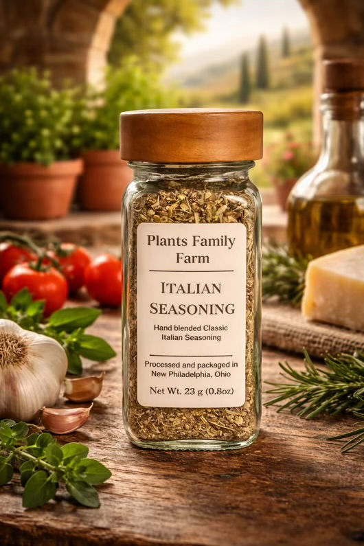 Jar of Italian seasoning with fresh ingredients