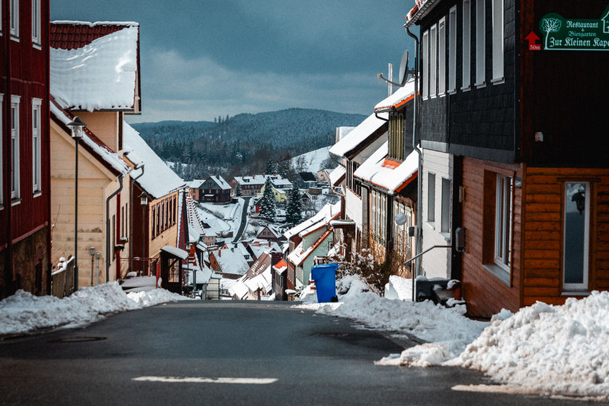 Cinematic street photography by photographer Adam Kaiser-Lynch. Village in germany in snow