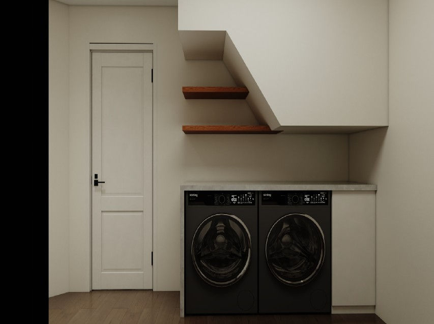 Laundry area with washer and dryer integrated beneath staircase storage.