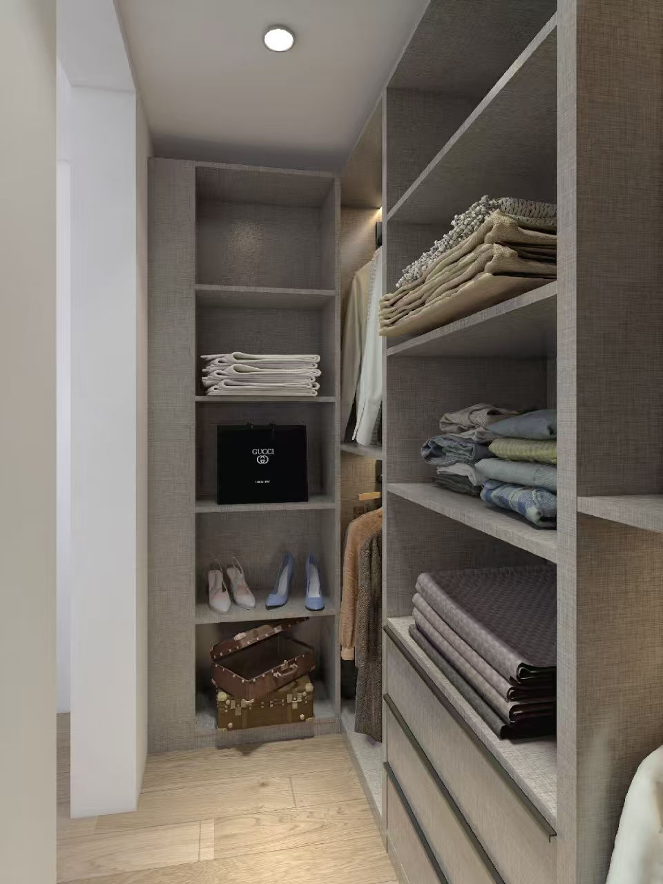 Compact walk-in closet with optimized shelving and hanging storage.
