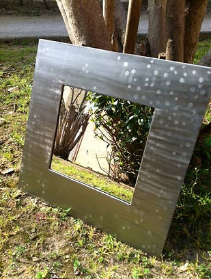 miroir acier brossé motifs trous