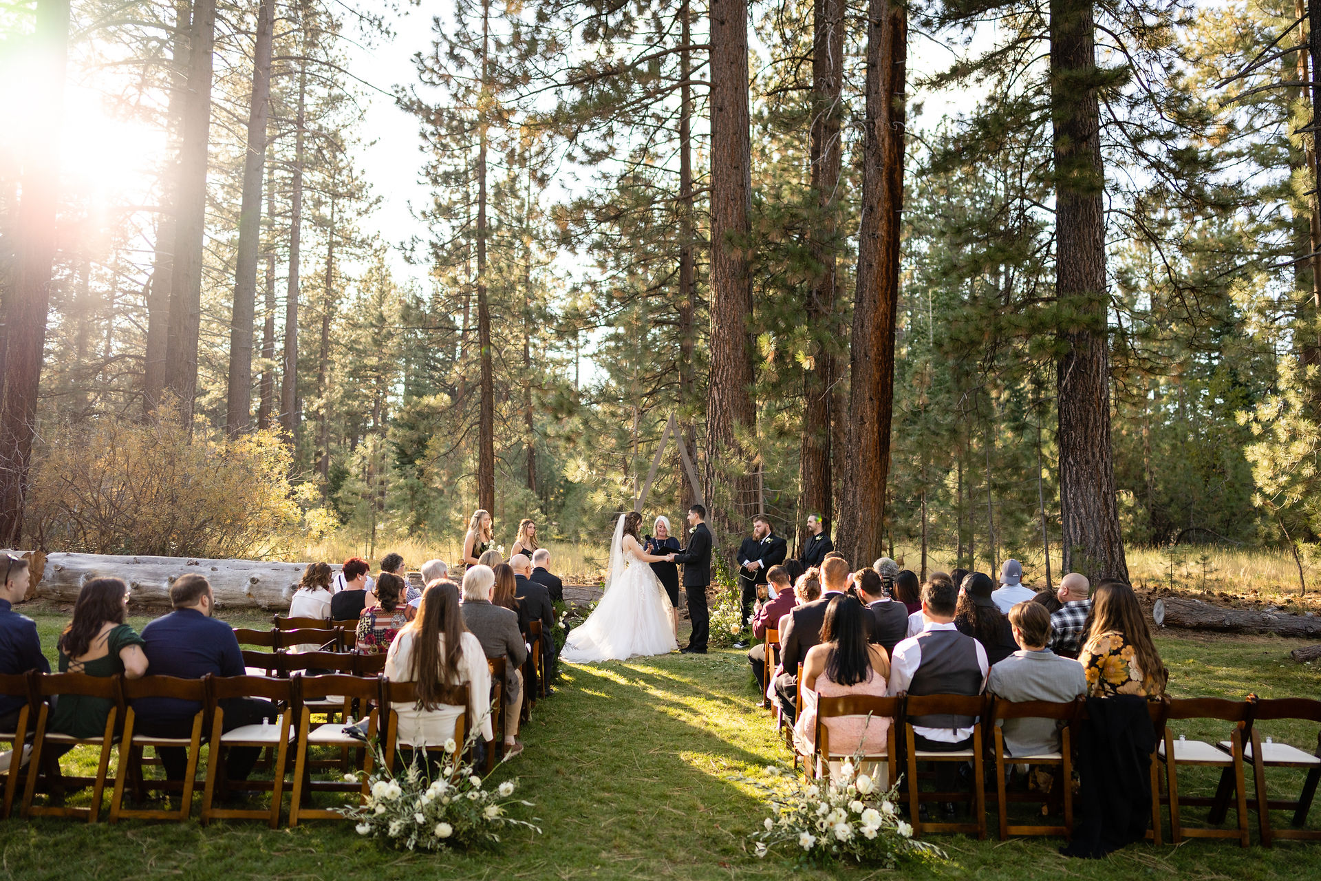 Lake Tahoe outdoor wedding ceremony among the trees.