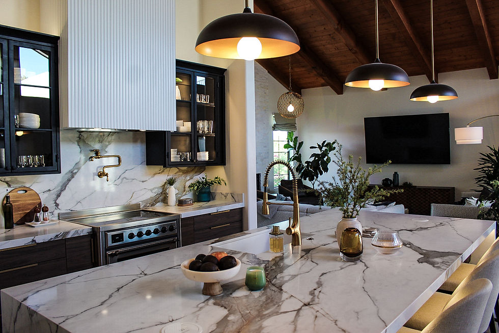 Eye-level view of a modern kitchen with sleek cabinetry and a large island