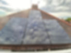 Solar panel (close up, front view) on a roof on a cloudy day