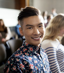 Smiling Student in Lecture after conquering his social anxiety at Approach IOP