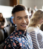 Smiling Student in Lecture