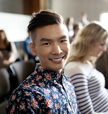 Smiling Student in Lecture