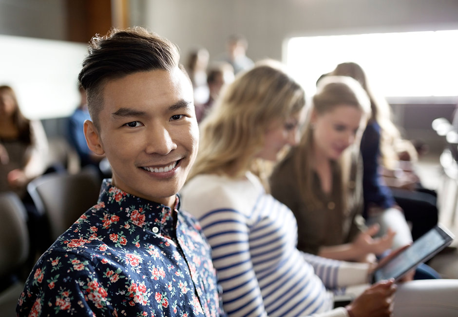 Smiling Student in Lecture
