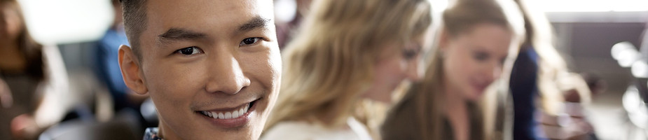 Smiling Student in Lecture