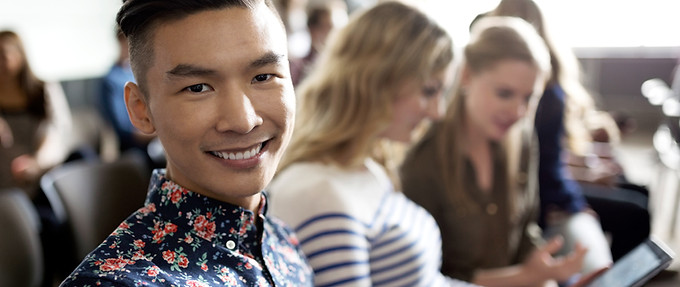 Smiling Student in Lecture