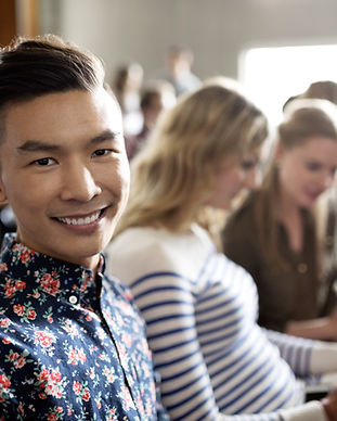 Smiling Student in Lecture
