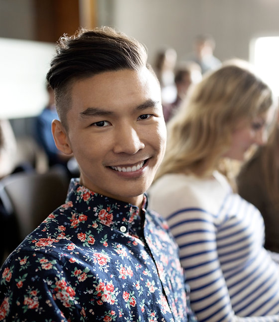 Smiling Student in Lecture