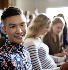 Smiling Student in Lecture