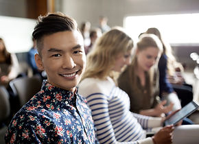 Smiling Student in Lecture