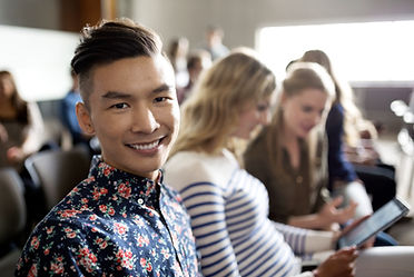 Smiling Student in Lecture