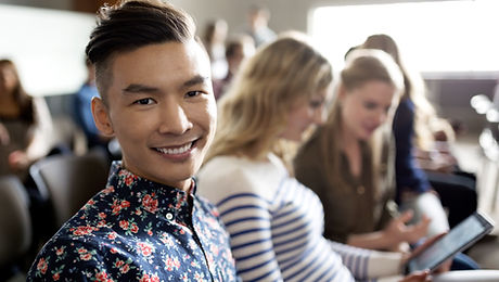 Smiling Student in Lecture