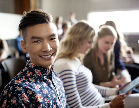 Smiling Student in Lecture