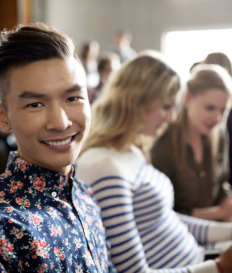 Smiling Student in Lecture