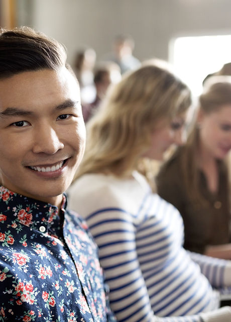 Smiling Student in Lecture