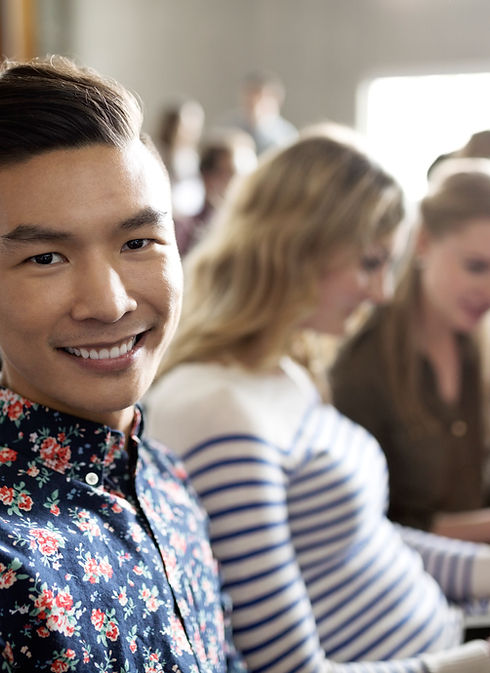 Smiling Student in Lecture