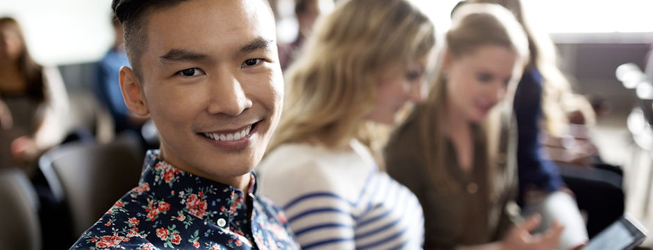 Smiling Student in Lecture