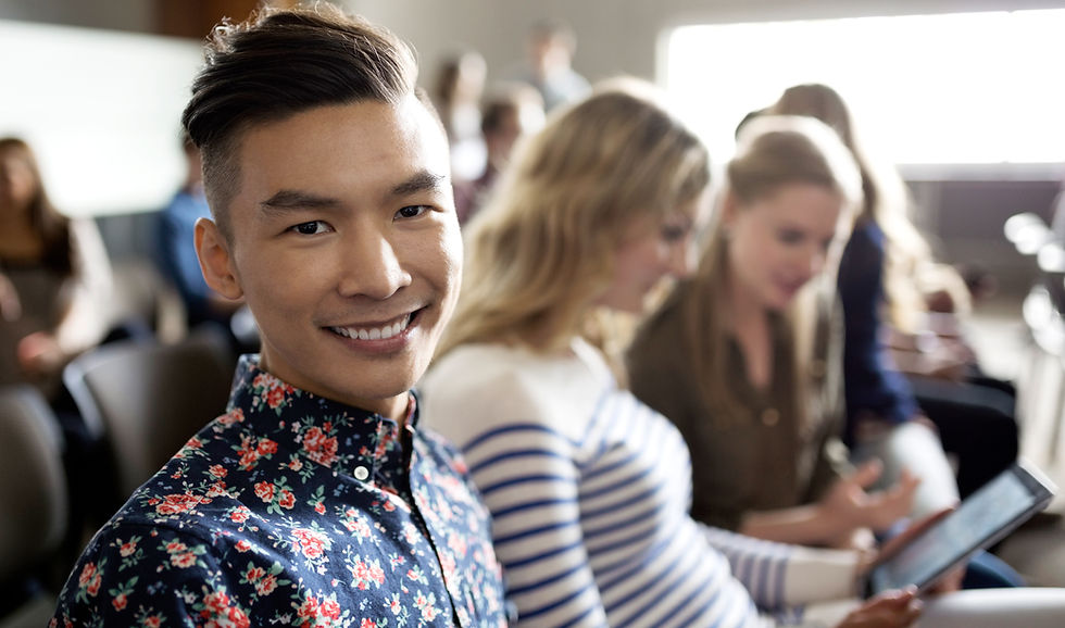 Smiling Student in Lecture