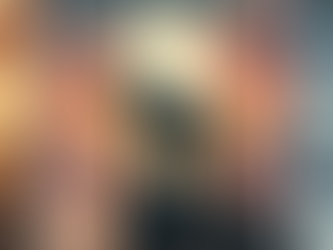 "A lone wolf stands on a mountain ridge at sunrise, its silhouette strong against the golden sky, symbolizing resilience, solitude, and strength."