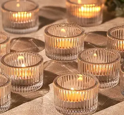 Classic and metallic votive holders designed to layer soft candlelight throughout your tablescape.