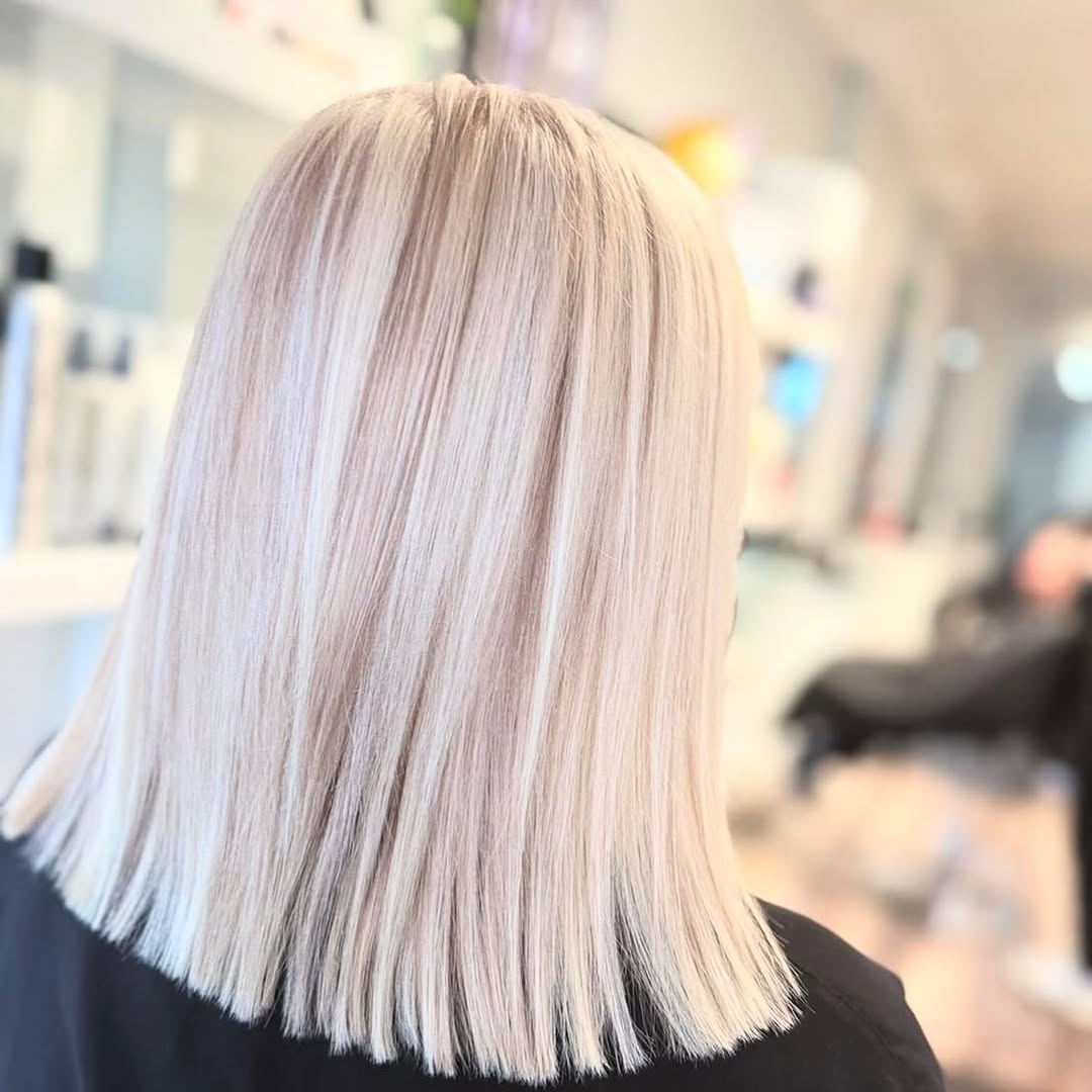 Layered haircut for women at Calia Hair Toronto — long layers and texture