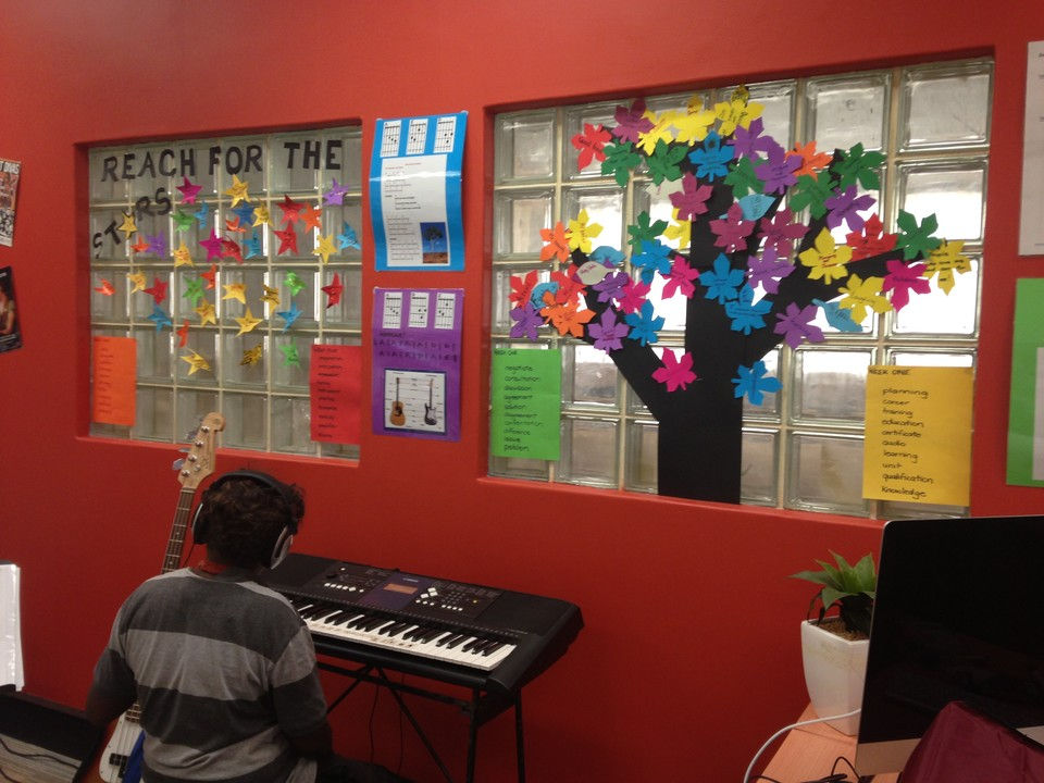 kid playing the piano