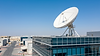 a_high_quality_professional_photograph_of_a_modern_satellite_dish_mounted_on_a.png