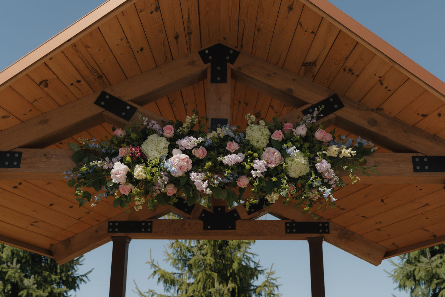 Colorful pastel arbor florals at Caberfae Peaks.