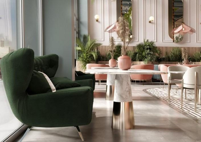 Elegant green velvet chairs in a modern cafe