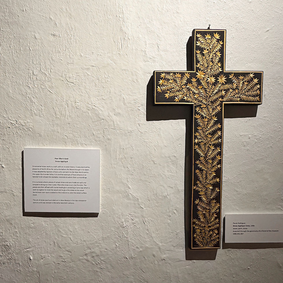The "gold" on this cross is actually made through a straw appliqué method.