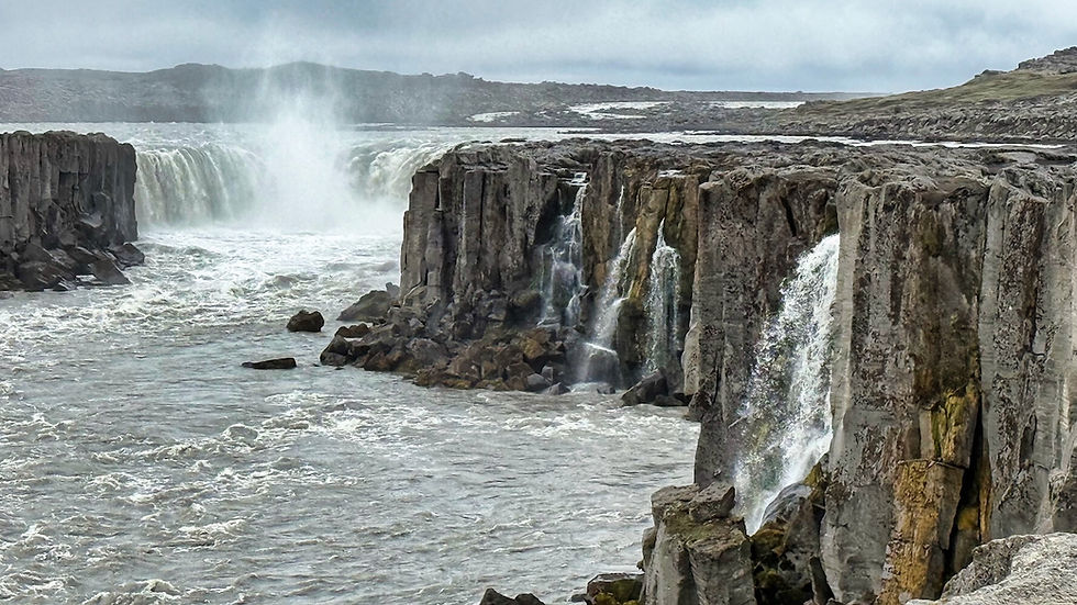 Dettisfoss is actually a series of four waterfalls, including large ones upstream.