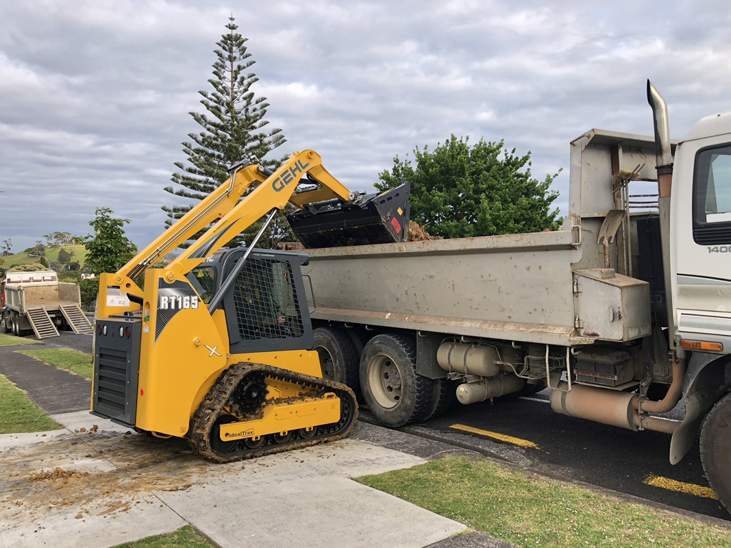 Gehl loader in suburban street