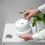 Thumbnail: FIXA Stick-on Floor Protectors Set of 20, Grey by IKEA